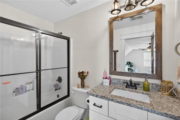 a view of a swimming pool with a yard