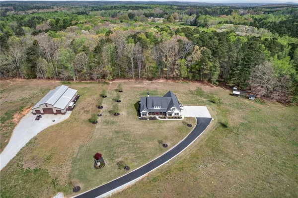 a view of a hallway with seating area