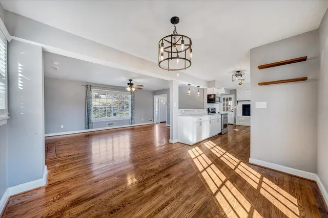 a kitchen with a sink cabinets and window