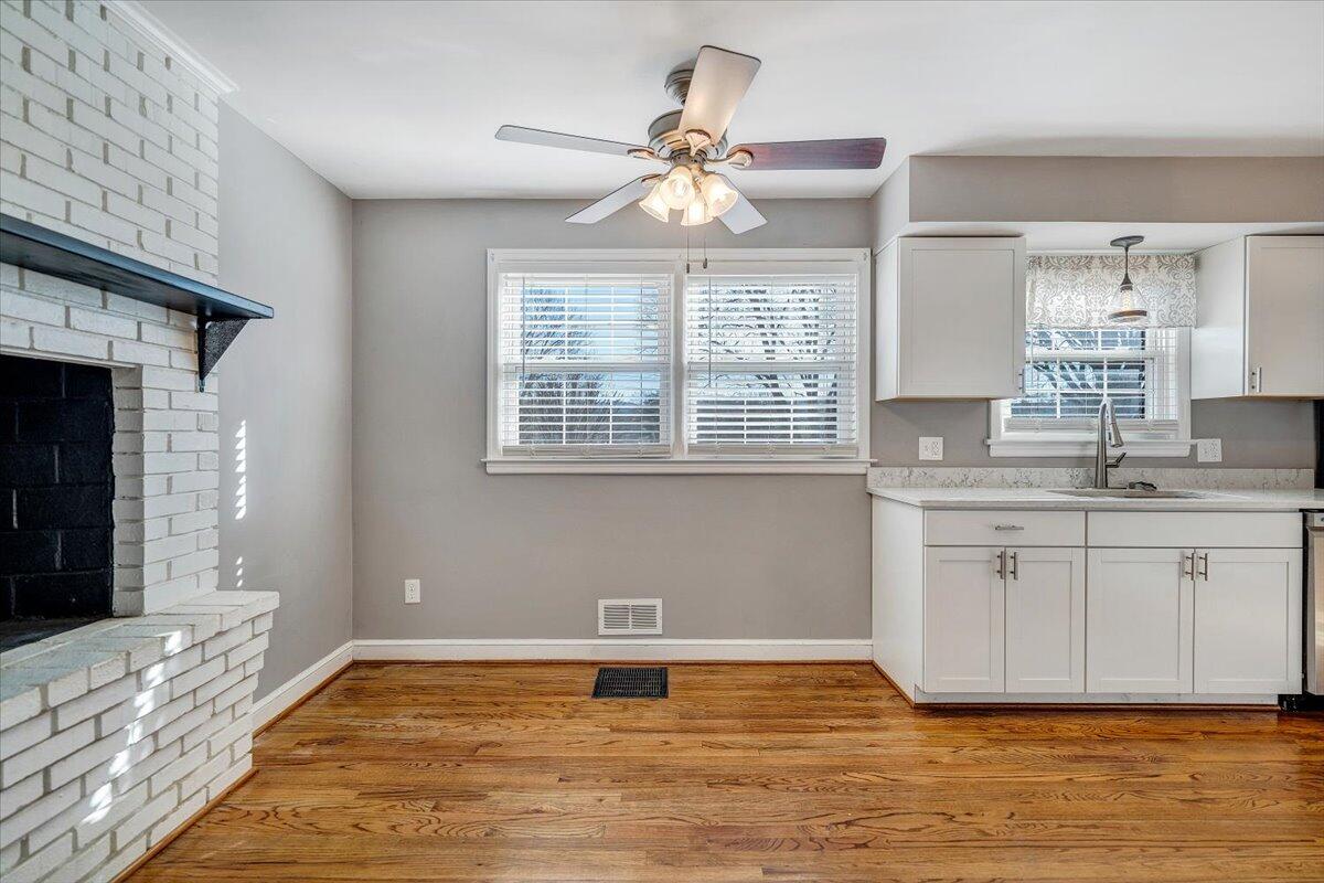 3584 Cedar Lane Roanoke, VA 24018 - Photo 19 of 75 a view of an empty room with window and wooden floor