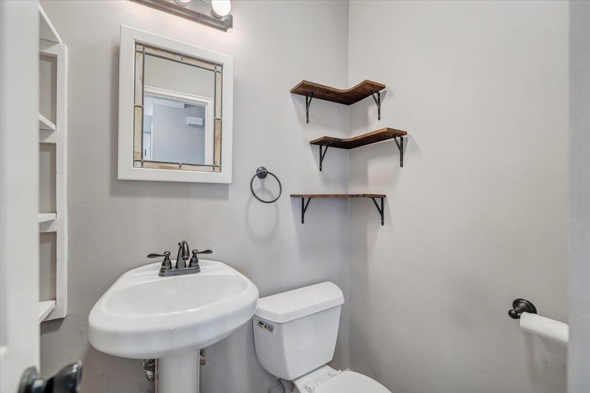 3584 Cedar Lane Roanoke, VA 24018 - Photo 24 of 75 a bathroom with a toilet sink and mirror
