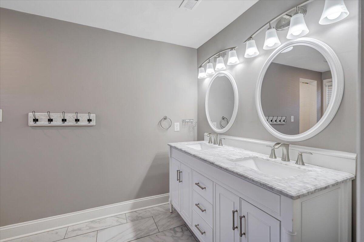 3584 Cedar Lane Roanoke, VA 24018 - Photo 35 of 75 a bathroom with a granite countertop double vanity sink and a mirror