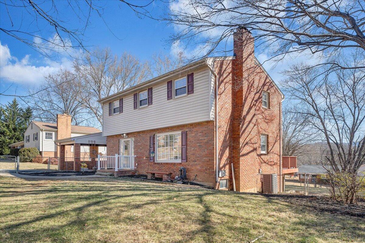 3584 Cedar Lane Roanoke, VA 24018 - Photo 74 of 75 a view of a house with a patio and a yard