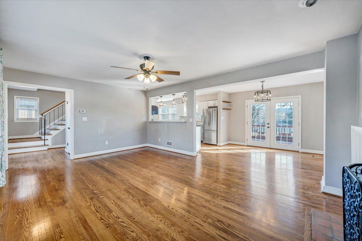 3584 Cedar Lane Roanoke, VA 24018 - Photo 9 of 75 a view of an empty room with wooden floor and a window