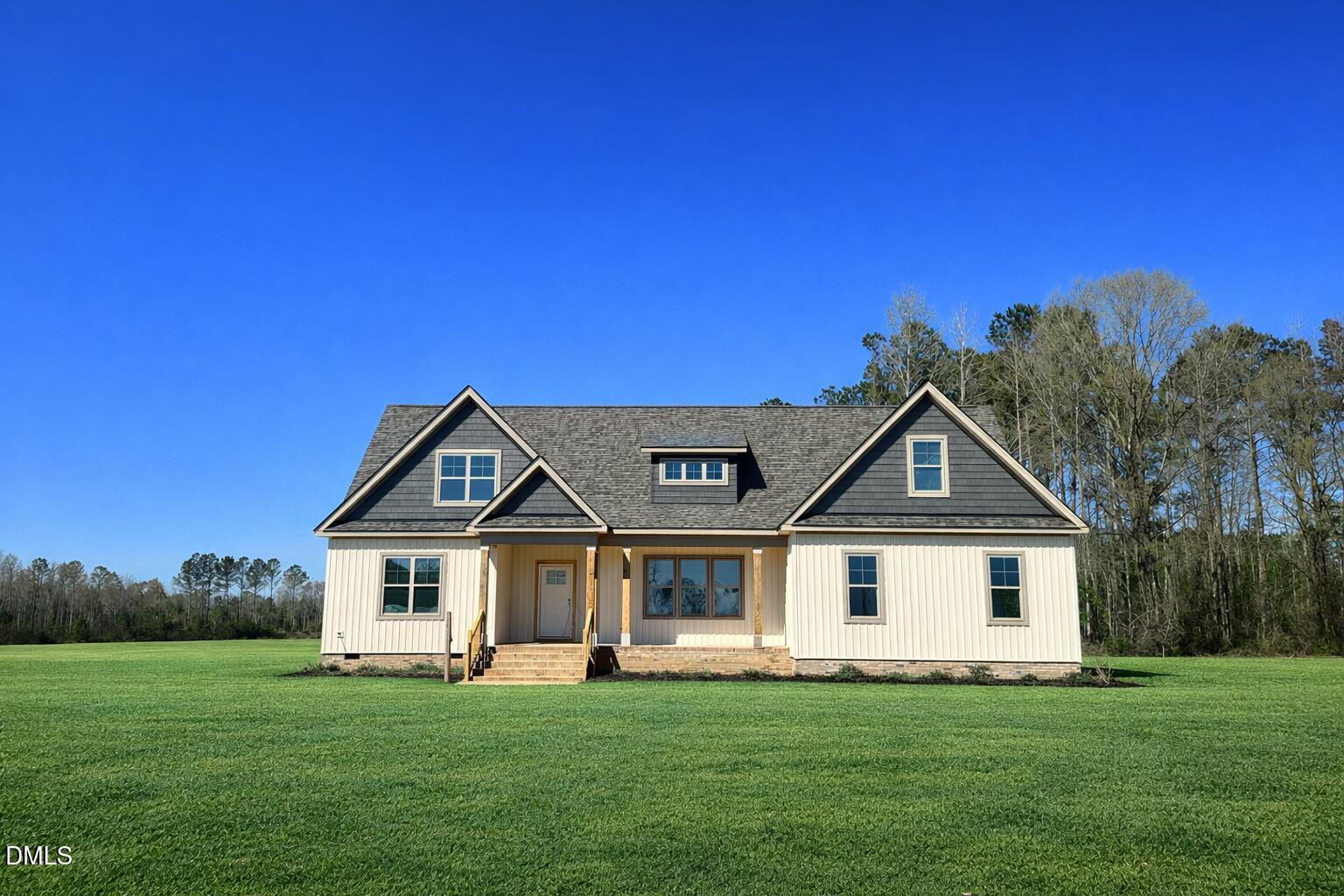 1179 Beulahtown Road Kenly, NC 27542 - Photo 1 of 26 a front view of a house with a yard