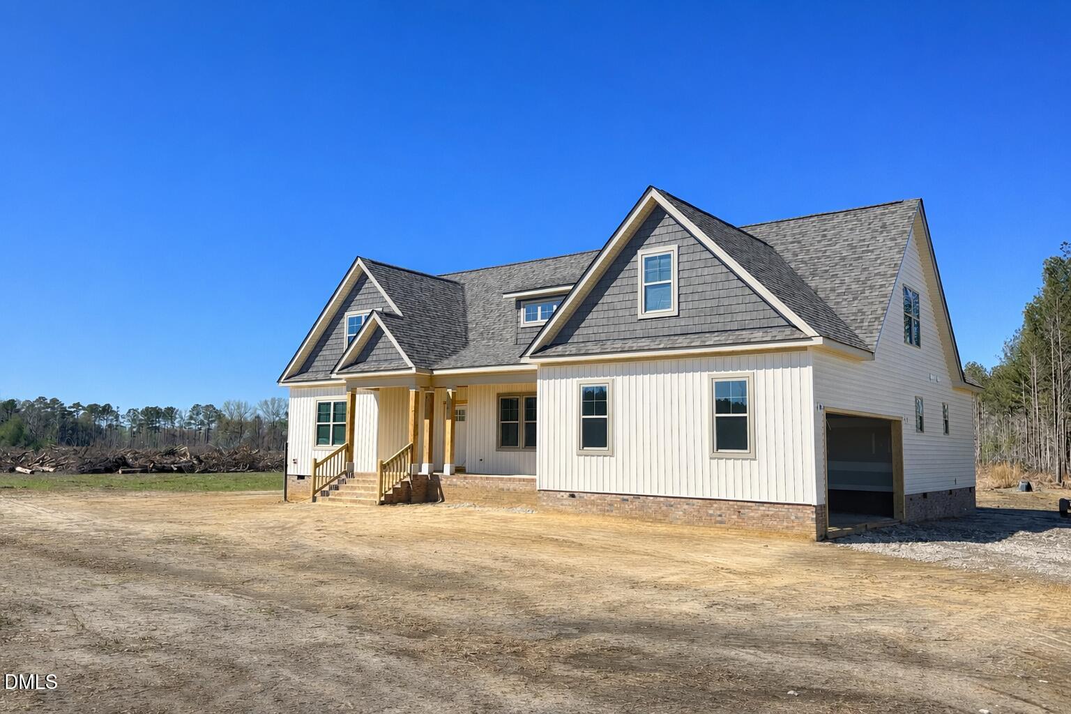 1179 Beulahtown Road Kenly, NC 27542 - Photo 3 of 26 a front view of a house with a yard