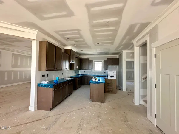 a kitchen view with a stove and a refrigerator