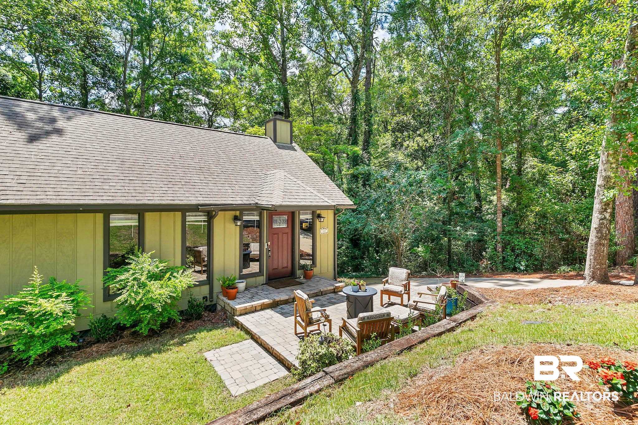 332 Ridgewood Drive Daphne, AL 36526 - Photo 7 of 48 View of front of house with a chimney, roof with shingles, and a front yard