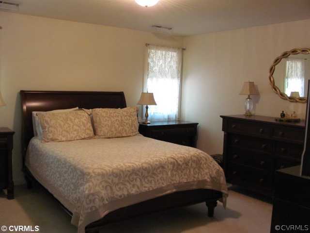 17168 Tulip Poplar Road Beaverdam, VA 23015 - Photo 11 of 12 Master Bedroom - Features two separate walk in clo