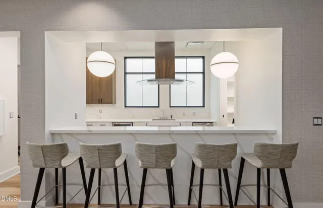 a view of a dining room and chairs