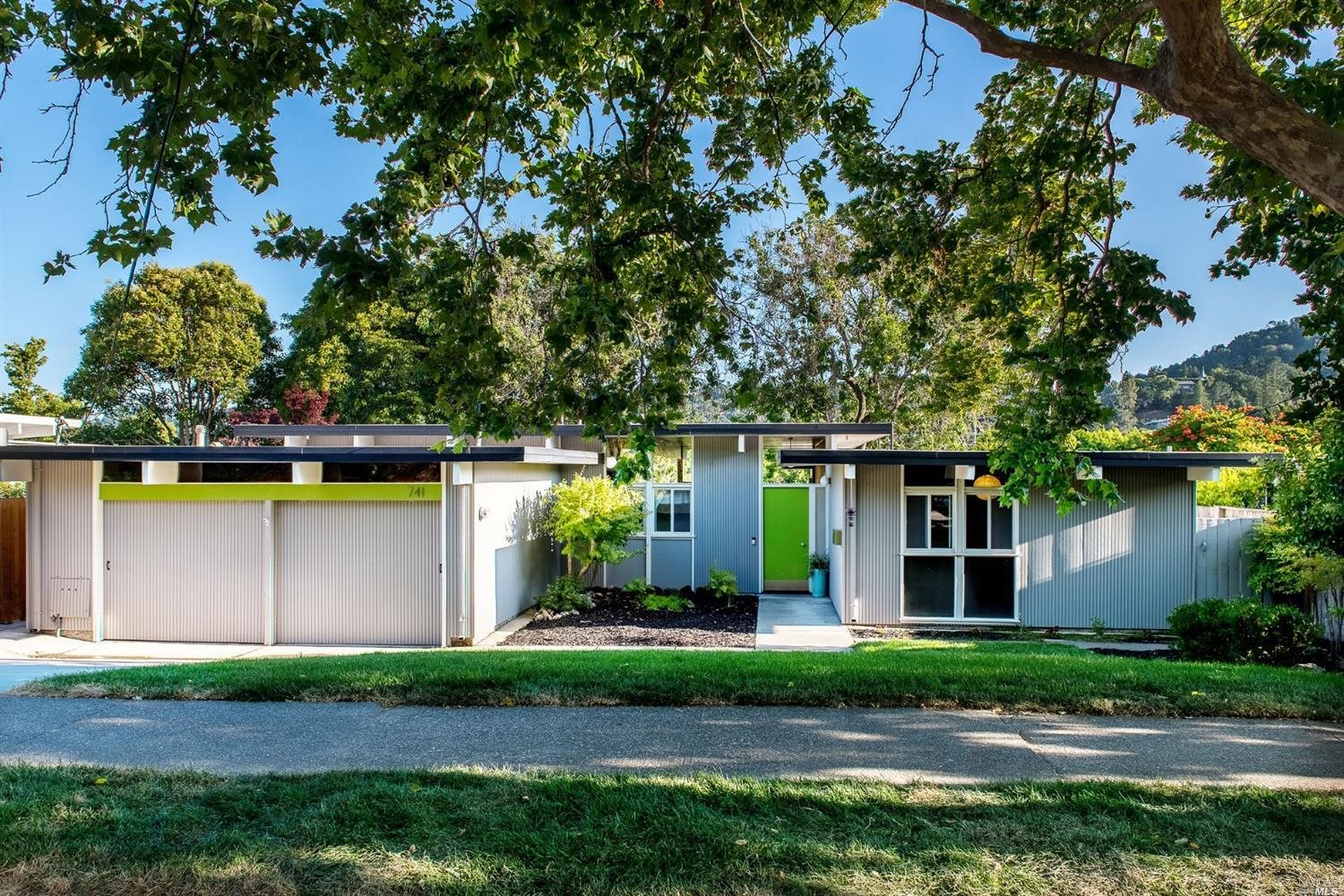 741 Las Colindas Road San Rafael, CA 94903 - Photo 1 of 1 a front view of a house with garden