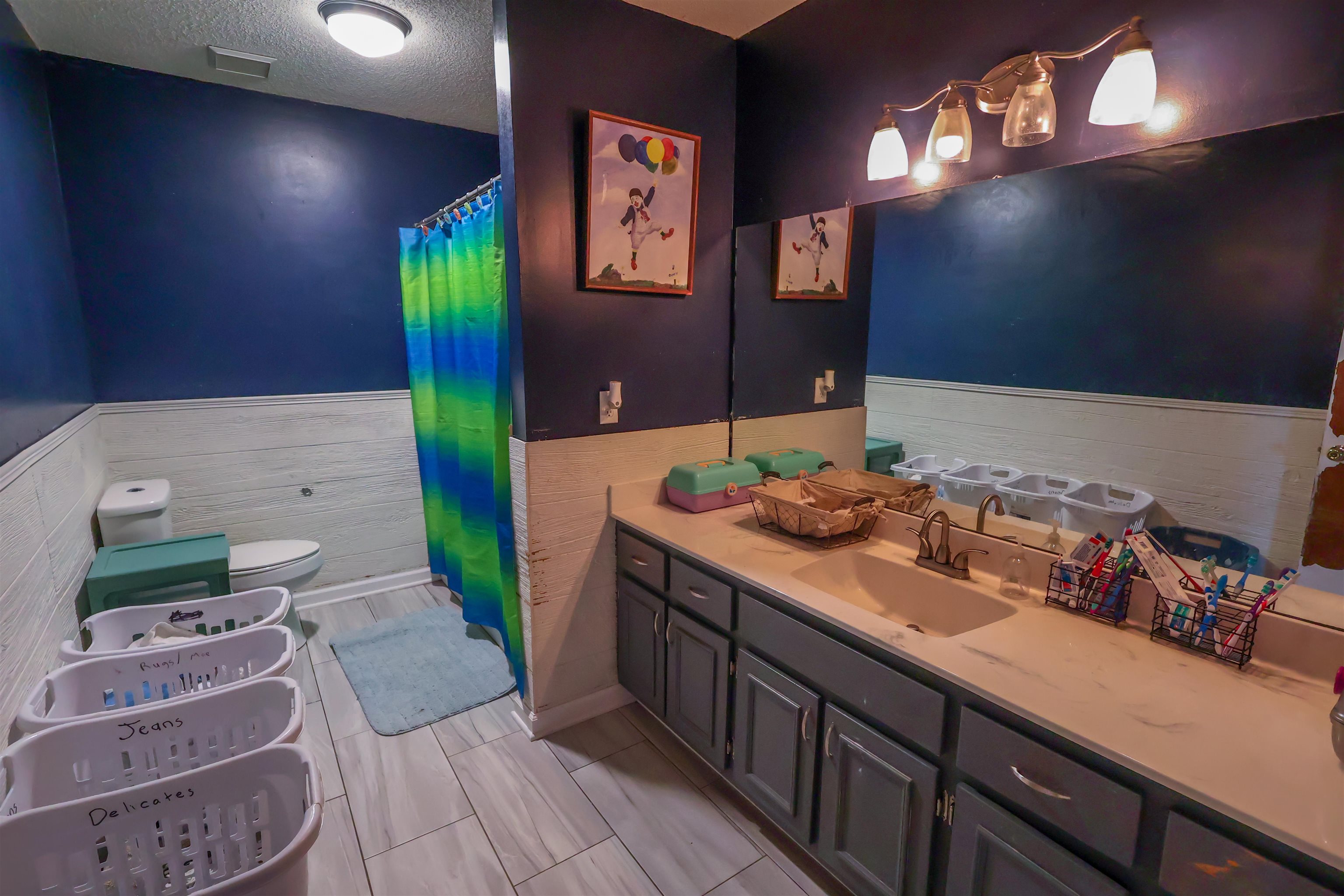 157 Nancye Reeder Avenue Munford, TN 38058 - Photo 12 of 17 a bathroom with a sink and a mirror