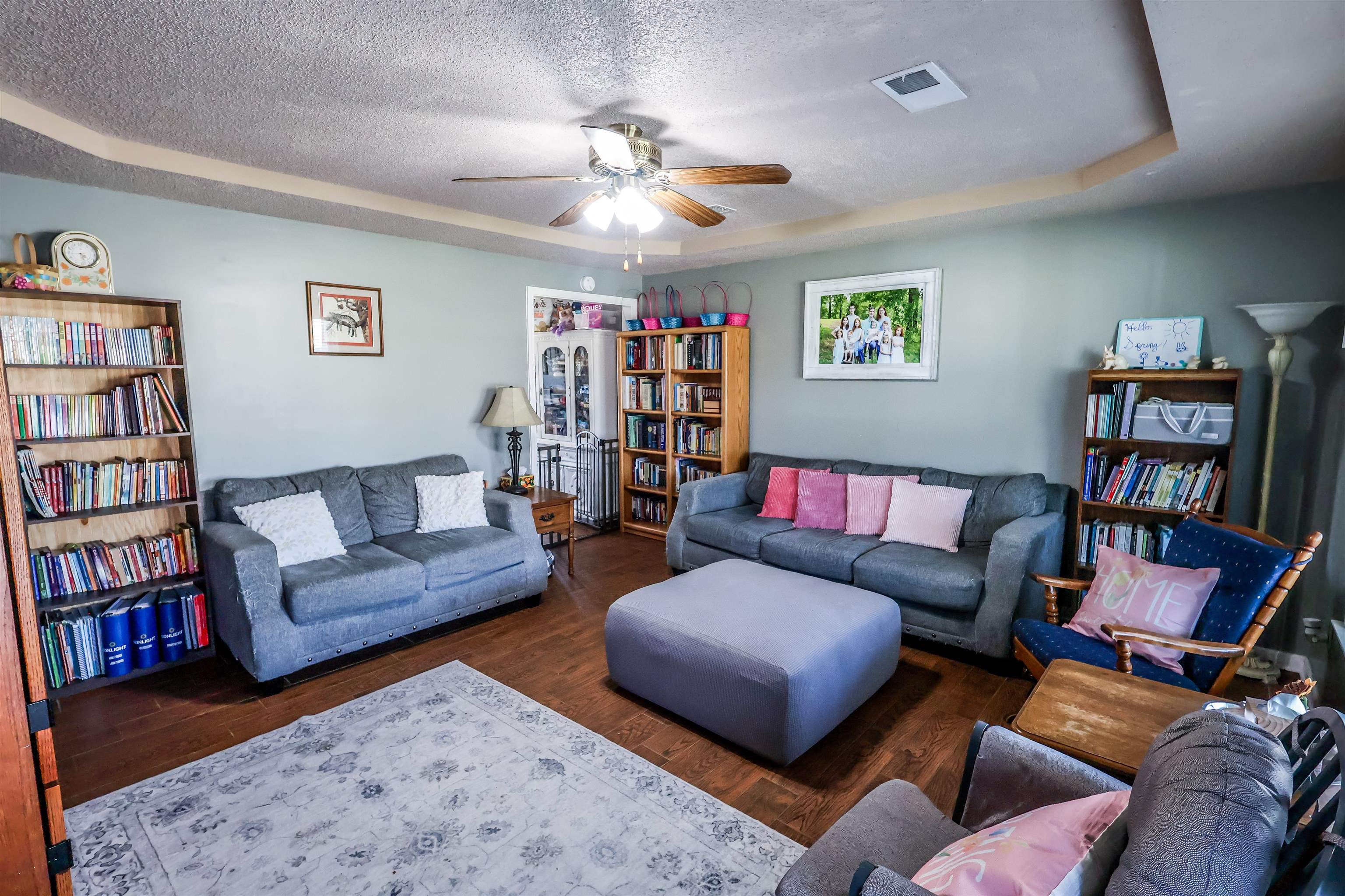 157 Nancye Reeder Avenue Munford, TN 38058 - Photo 14 of 17 a living room with furniture and a book shelf