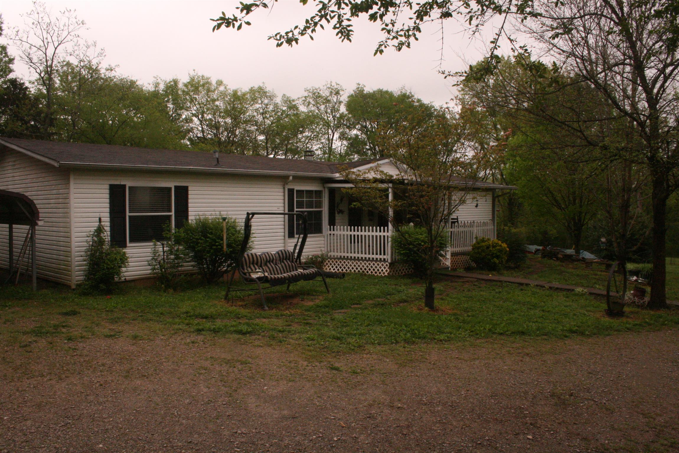 2798 Water Valley Road Santa Fe, TN 38482 - Photo 3 of 28 a view of a house with backyard and garden