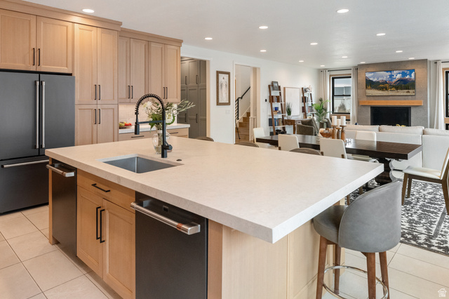 11617 South Wildrye Field Way Draper, UT 84020 - Photo 50 of 53 Kitchen with light tile patterned floors, white oak cabinets, recessed lighting, stainless steel appliances, and open floor plan
