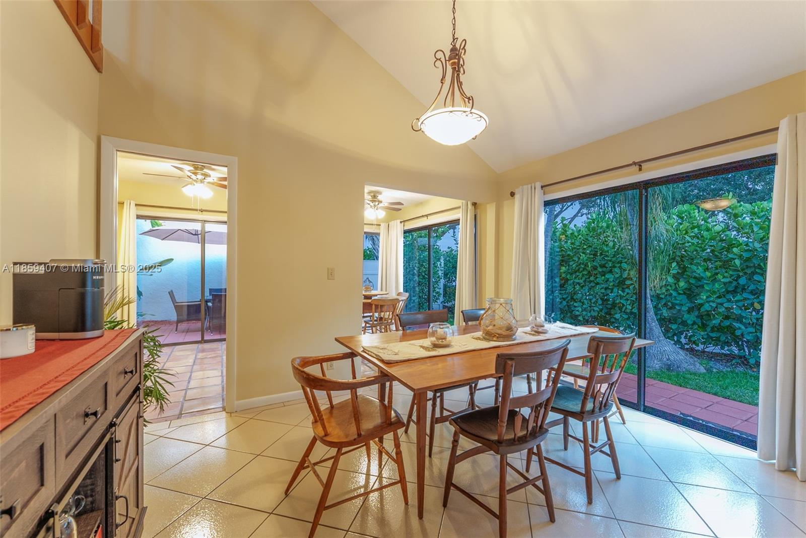 17068 Traverse Circle Jupiter, FL 33477 - Photo 19 of 72 a dining room with furniture window and outside view