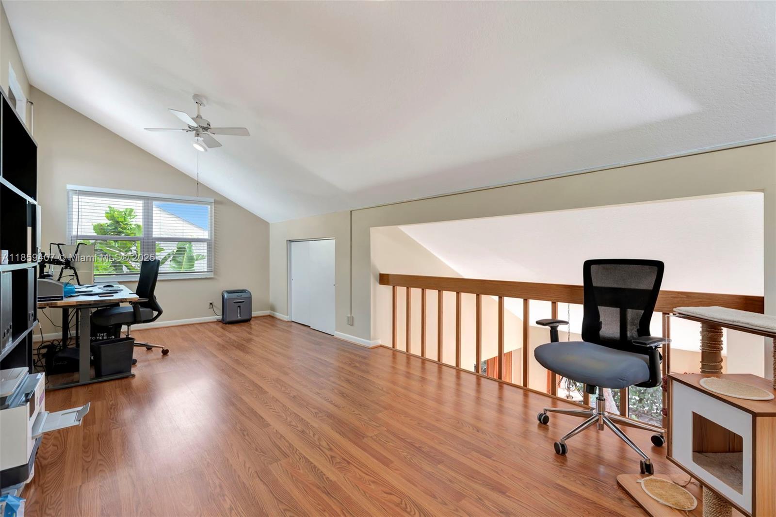 17068 Traverse Circle Jupiter, FL 33477 - Photo 31 of 72 a view of a livingroom with furniture a window and wooden floor