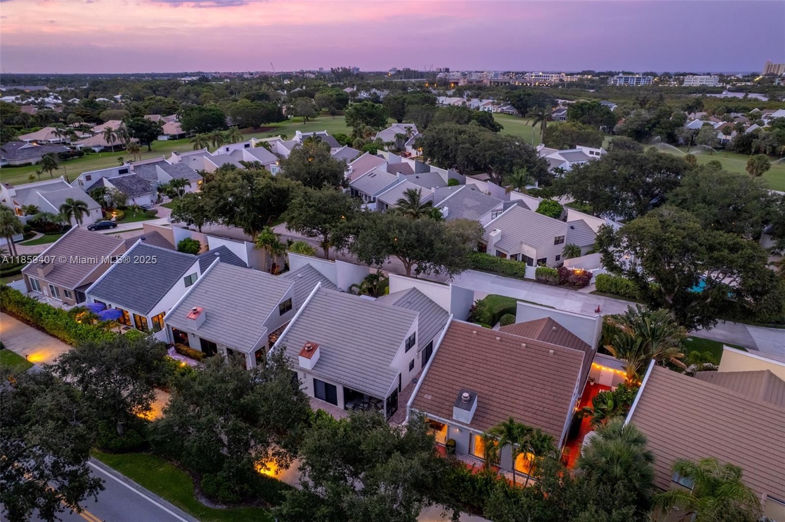 17068 Traverse Circle Jupiter, FL 33477 - Photo 46 of 72 an aerial view of residential houses with outdoor space and trees all around