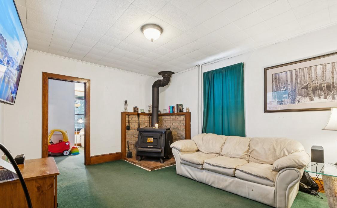 361 Democrat Road Gibbstown, NJ 08027 - Photo 5 of 12 Wood burning stove adds rustic charm.