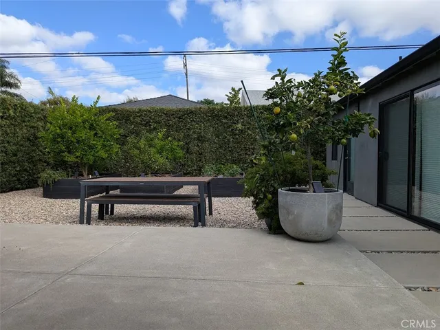 a view of outdoor space with seating and green space