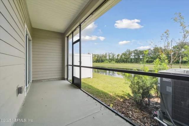 a view of a lake with a big yard