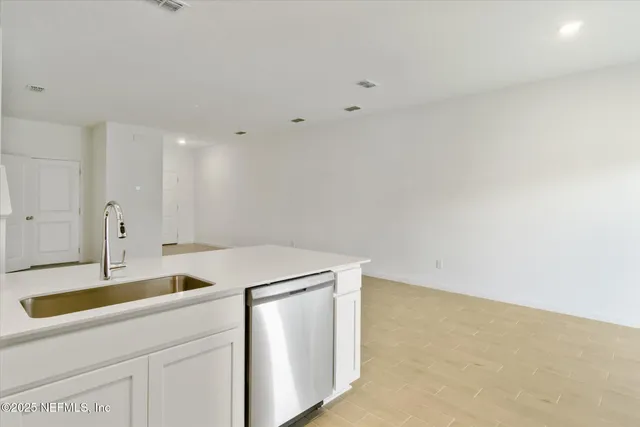a bathroom with a sink and a vanity