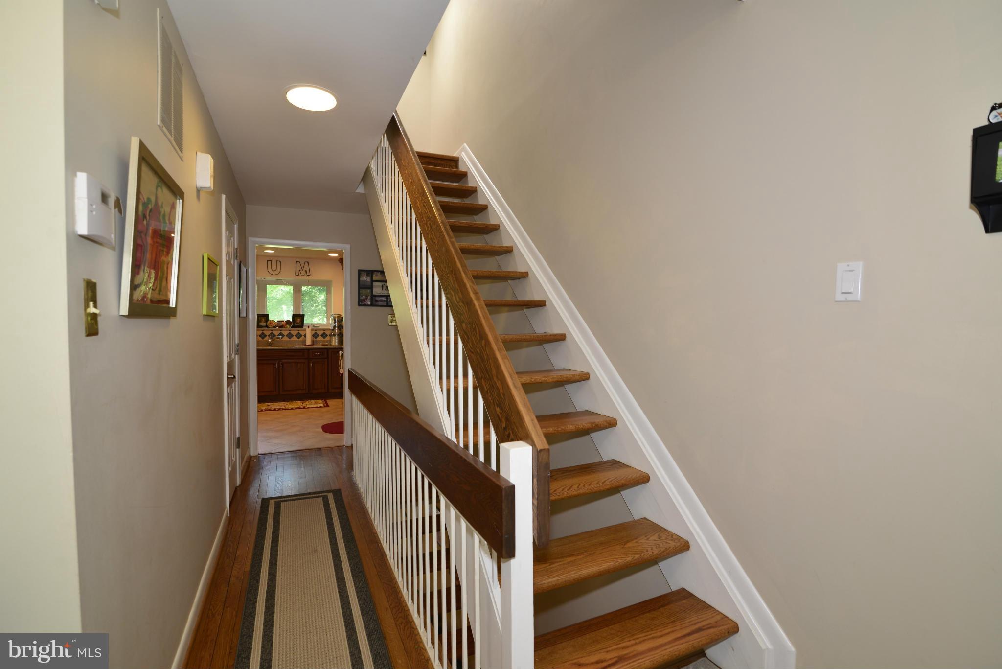 2065 Golf Course Drive Reston, VA 20191 - Photo 2 of 30 a view of entryway and hall with wooden floor