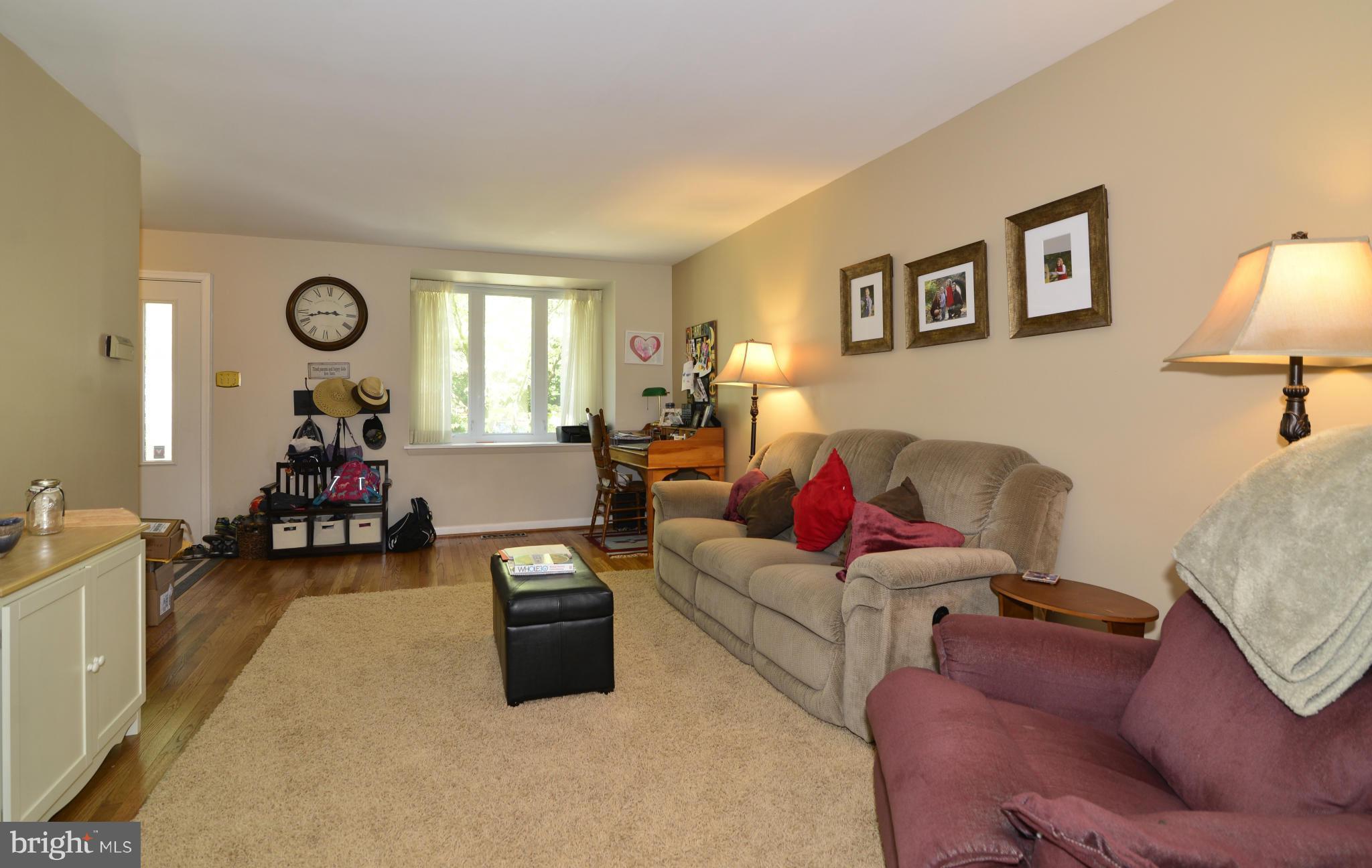 2065 Golf Course Drive Reston, VA 20191 - Photo 12 of 30 a living room with furniture and a wooden floor
