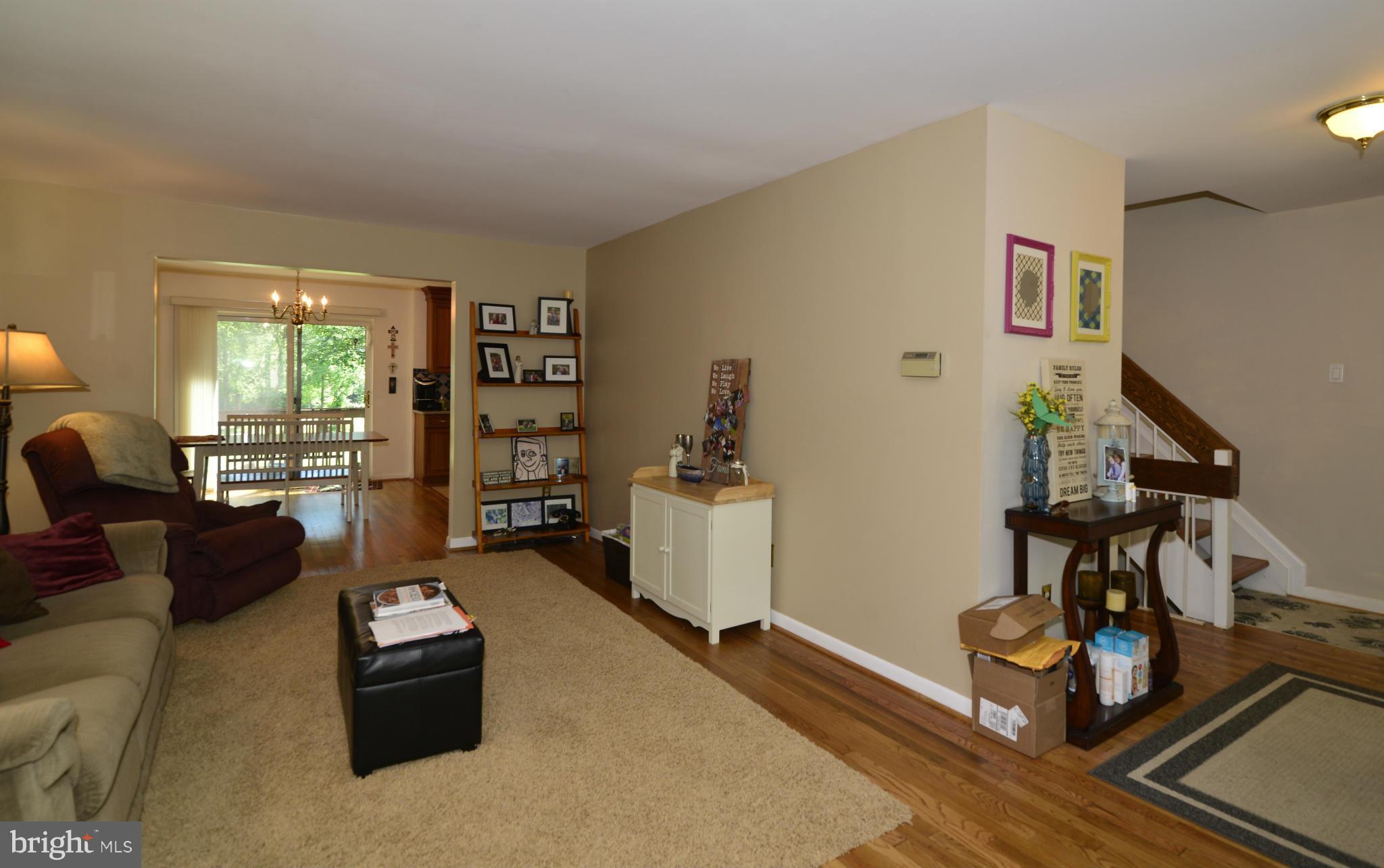2065 Golf Course Drive Reston, VA 20191 - Photo 14 of 30 a living room with furniture and hard wood flooring