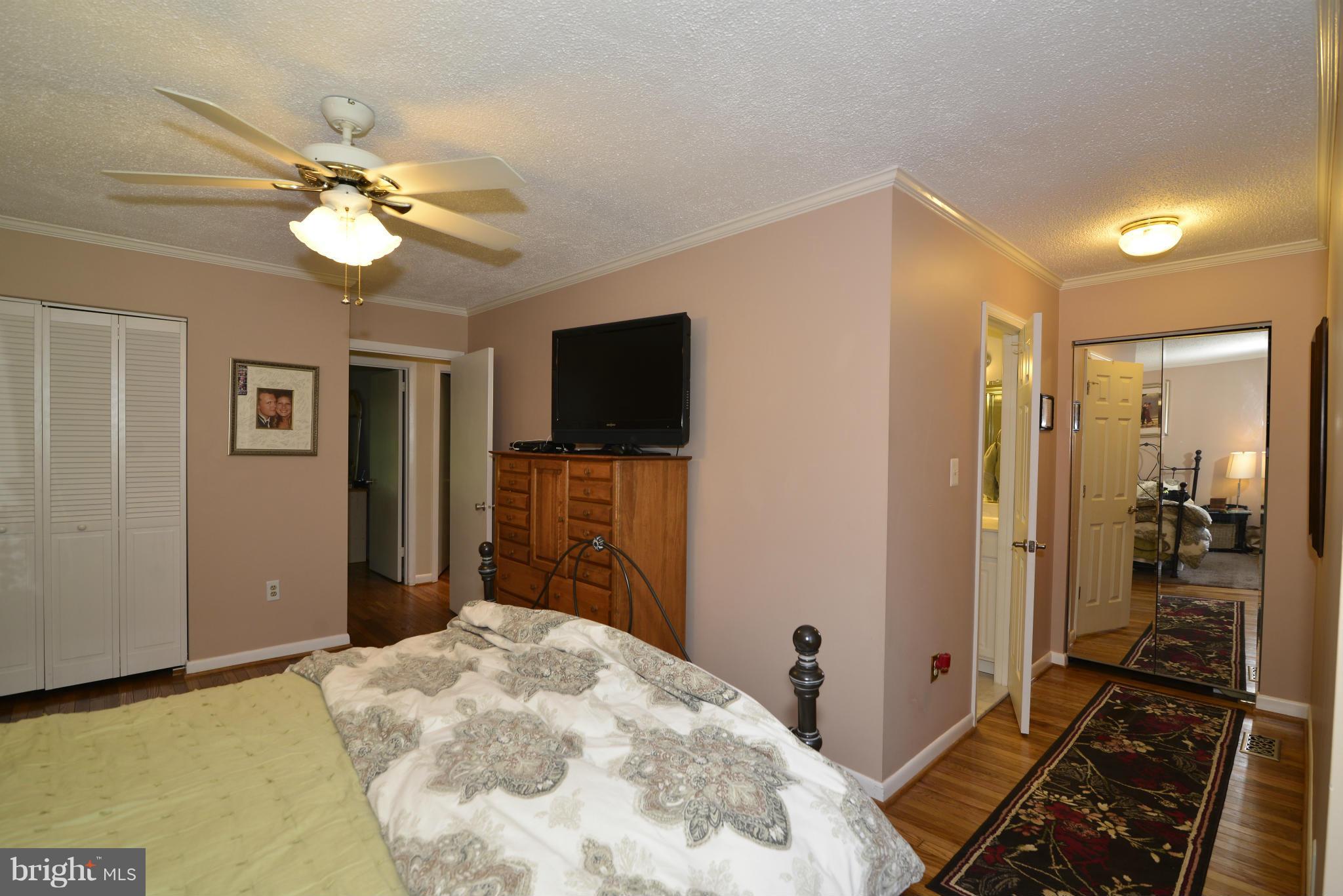2065 Golf Course Drive Reston, VA 20191 - Photo 16 of 30 a view of a livingroom with a flat screen tv