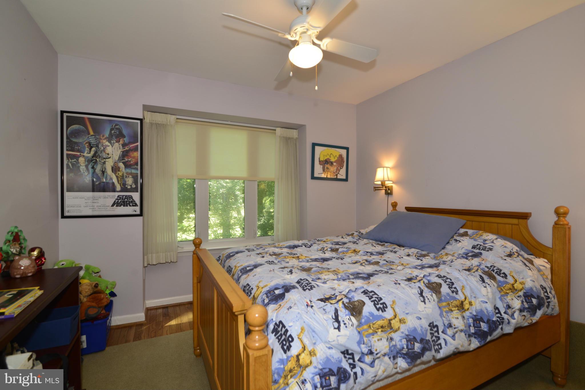 2065 Golf Course Drive Reston, VA 20191 - Photo 19 of 30 a bedroom with a bed and a window