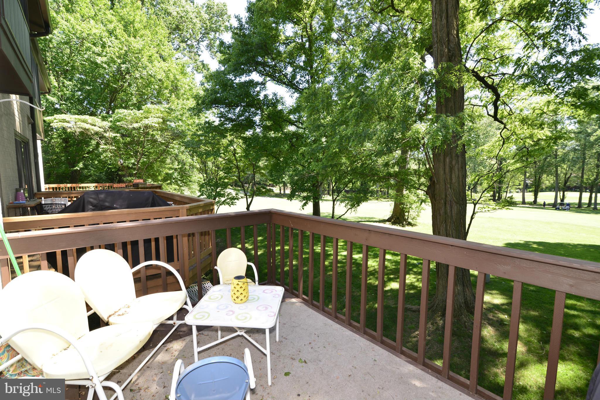 2065 Golf Course Drive Reston, VA 20191 - Photo 22 of 30 a view of a chairs and table in patio