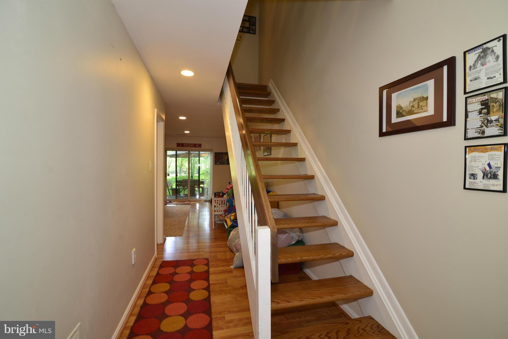 2065 Golf Course Drive Reston, VA 20191 - Photo 25 of 30 a view of entryway and hall with wooden floor