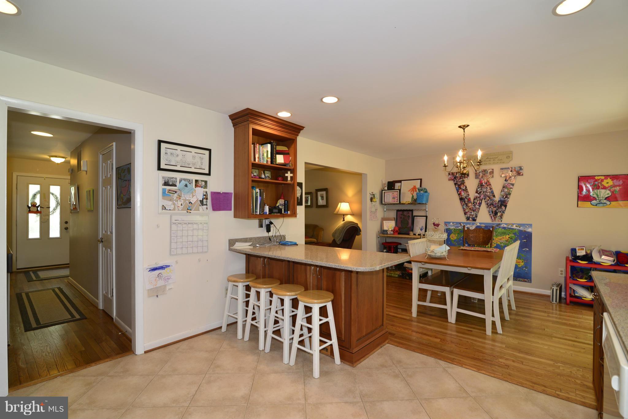 2065 Golf Course Drive Reston, VA 20191 - Photo 8 of 30 a view of a dining room with furniture