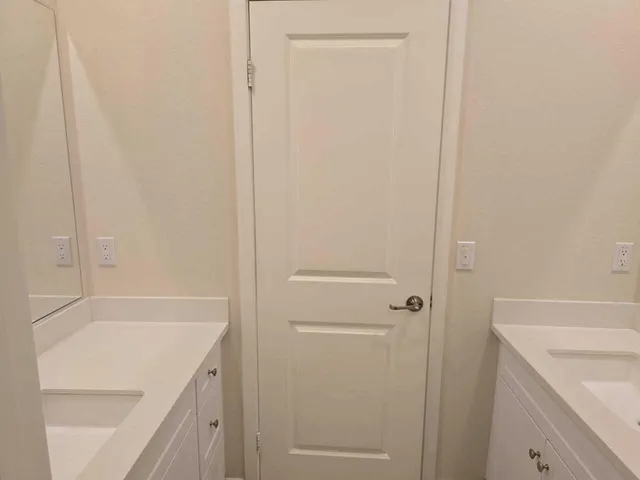 a bathroom with a sink and a bathtub