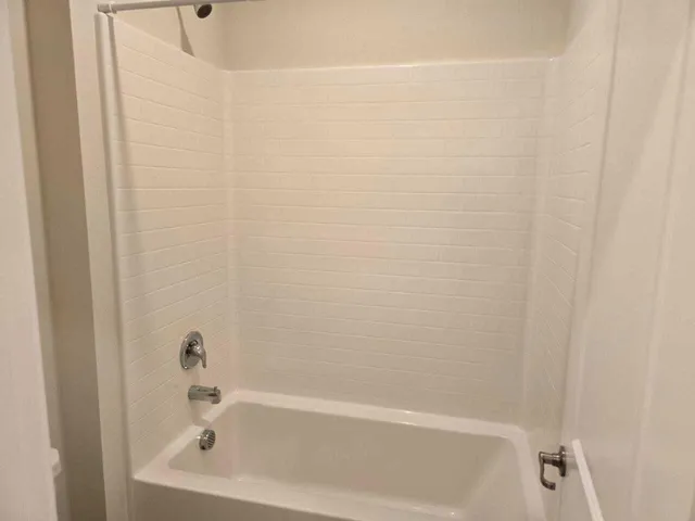 a bathroom with a bathtub