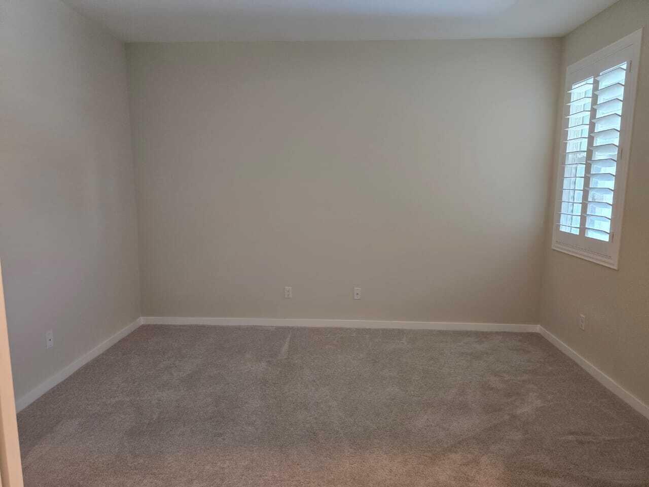 82117 Verdi Road Indio, CA 92203 - Photo 18 of 24 a view of an empty room with a window