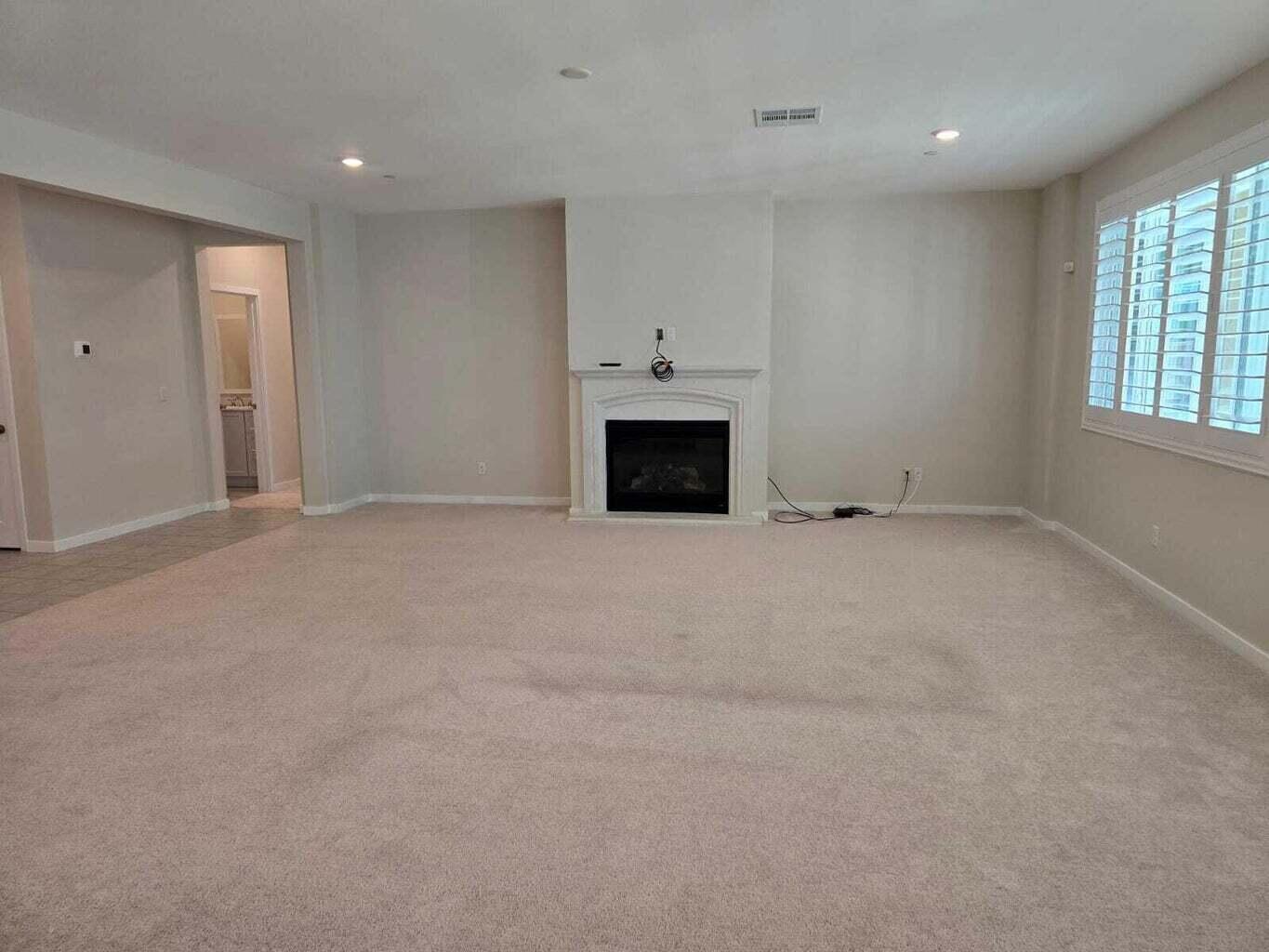 82117 Verdi Road Indio, CA 92203 - Photo 6 of 24 a view of empty room with a fireplace