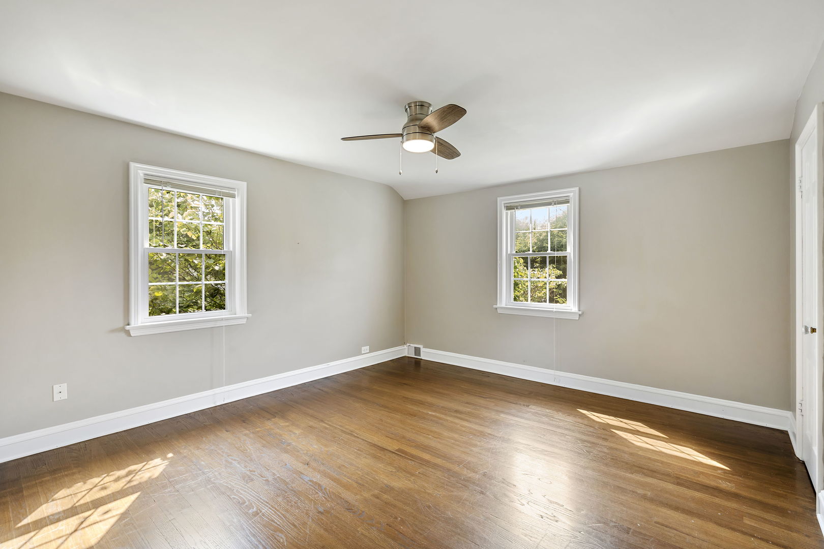 3901 Wolf Road Western Springs, IL 60558 - Photo 16 of 20 a view of empty room with wooden floor and fan