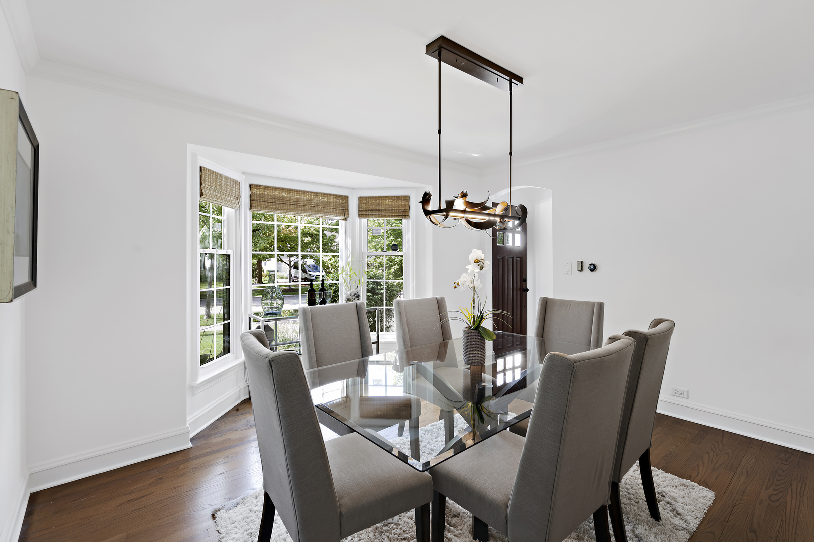 3901 Wolf Road Western Springs, IL 60558 - Photo 5 of 20 a view of a dining room with furniture window and wooden floor