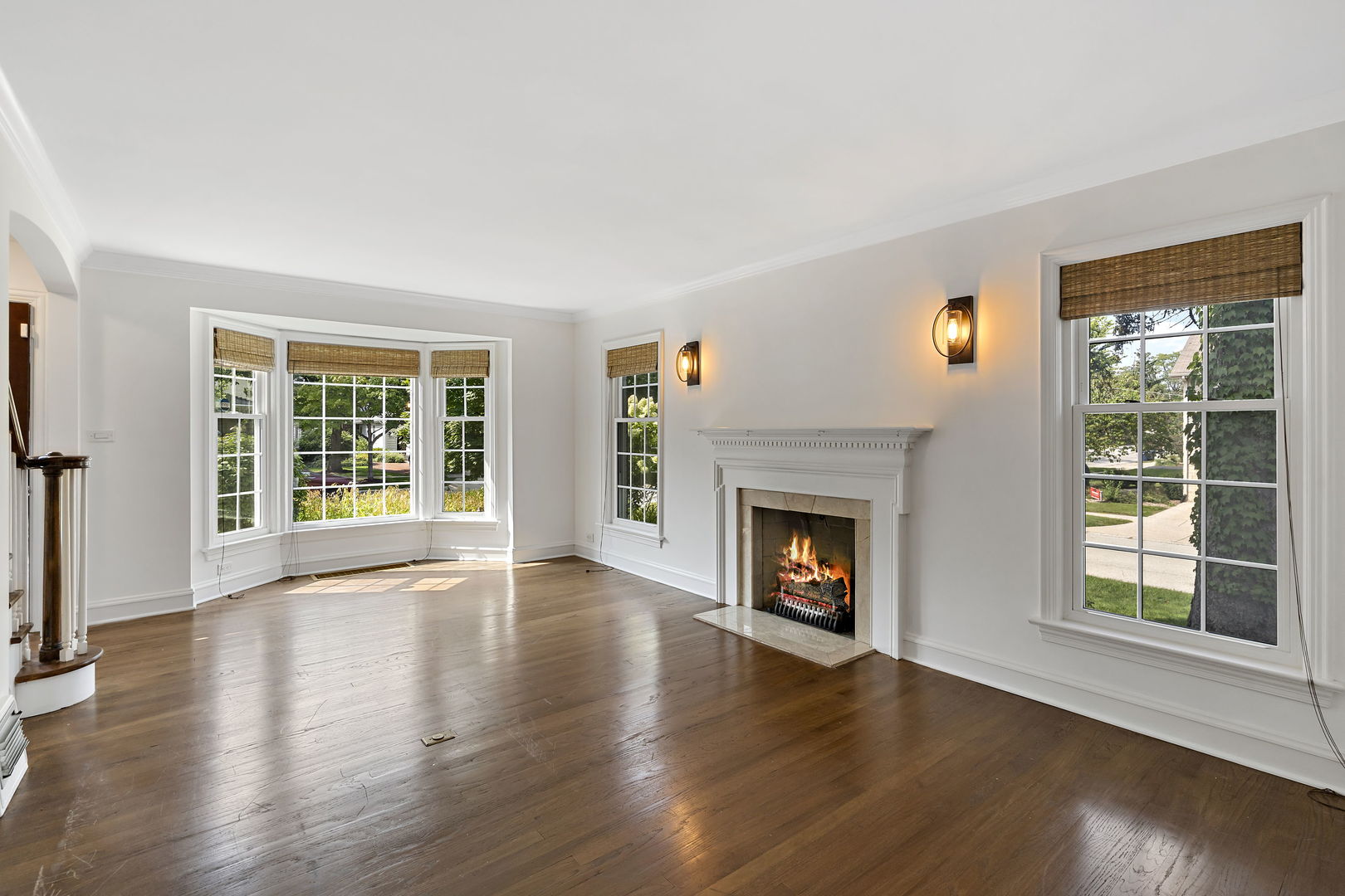 3901 Wolf Road Western Springs, IL 60558 - Photo 9 of 20 a view of an empty room with wooden floor and a window