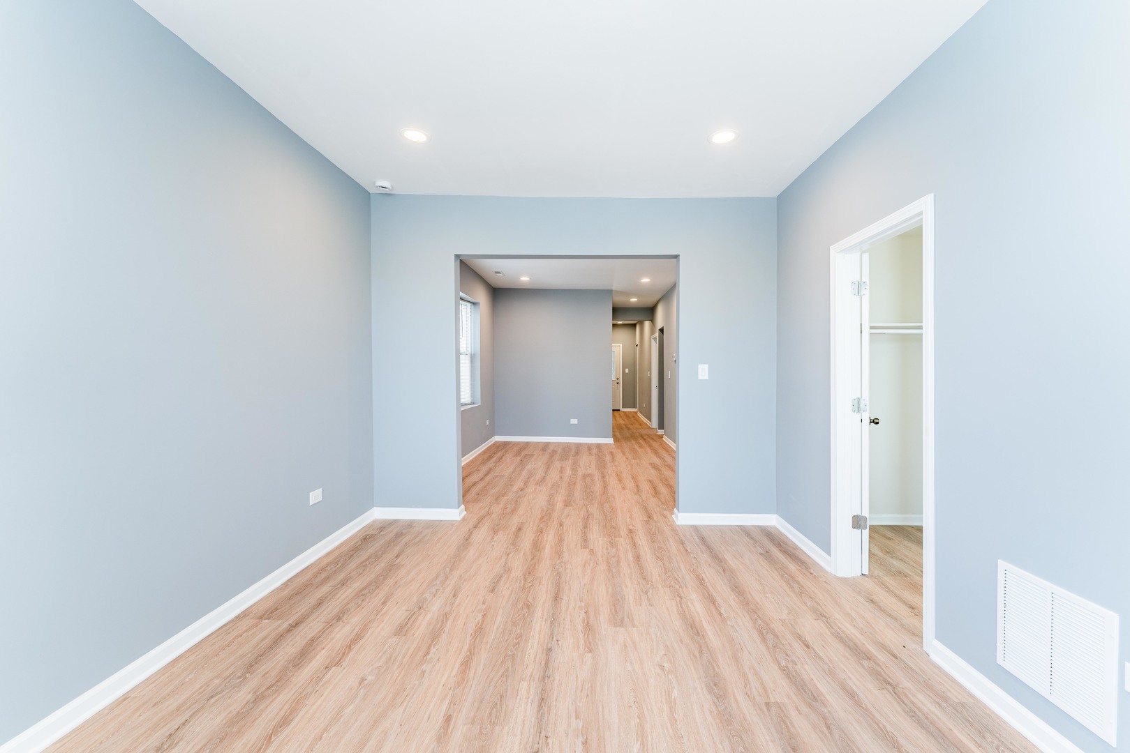 5025 West Huron Street, Unit 2 Chicago, IL 60644 - Photo 8 of 20 a view of a room with wooden floor