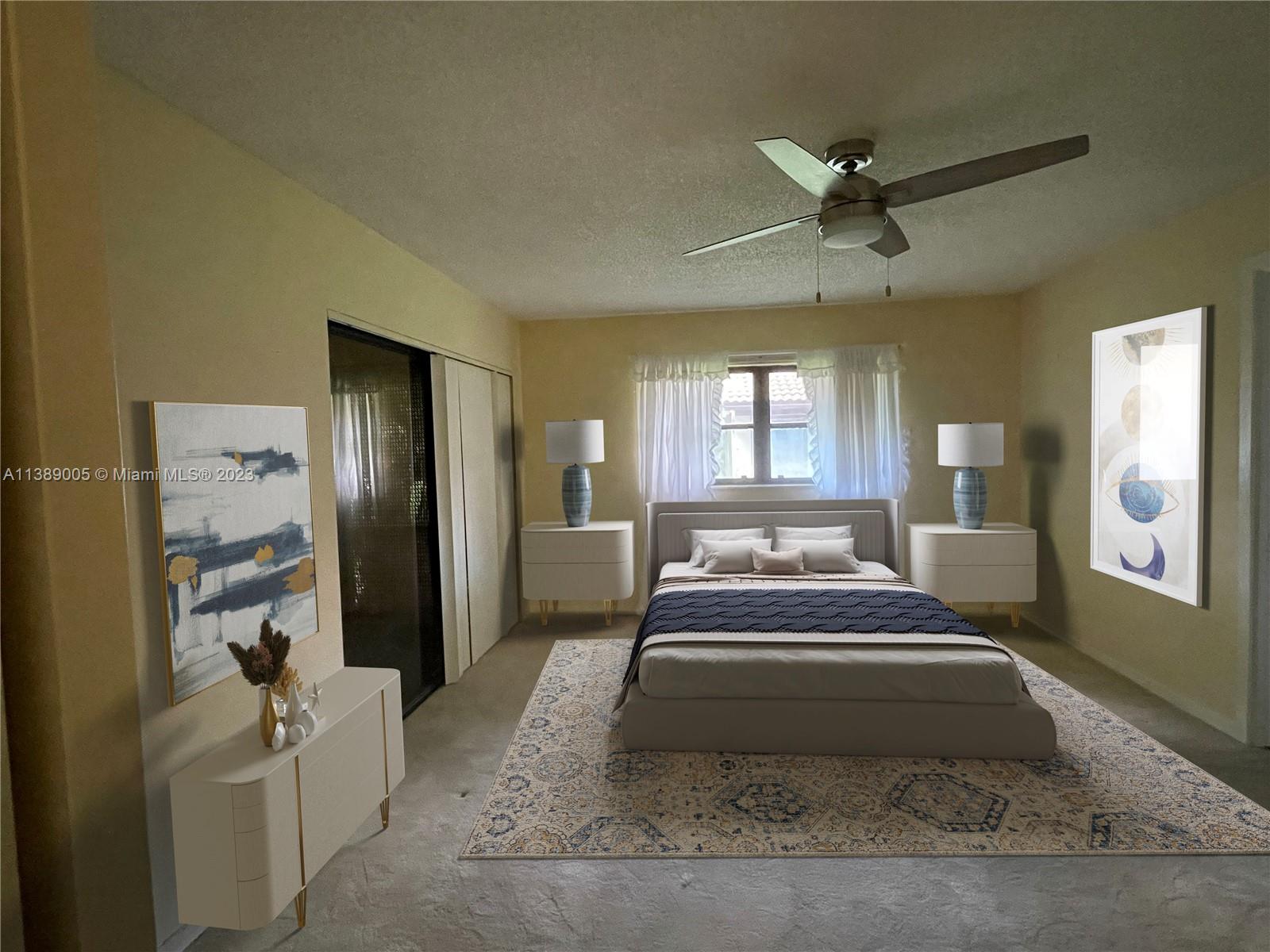 6848 Tiburon Drive Boca Raton, FL 33433 - Photo 7 of 12 a spacious bedroom with a bed a rug and ceiling fan