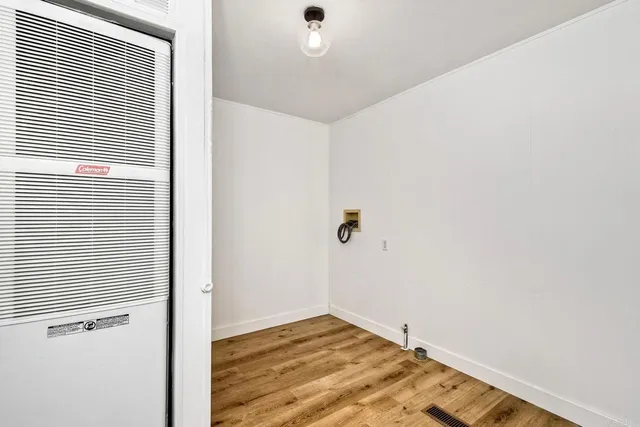 a view of a golf course with a lake view