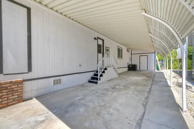a view of a park with large trees