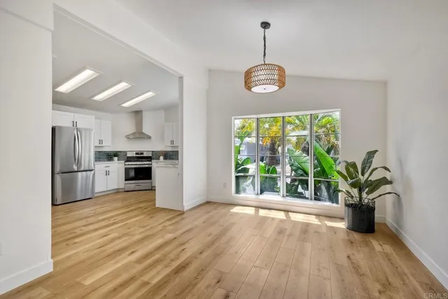 a view of a kitchen with microwave and stove