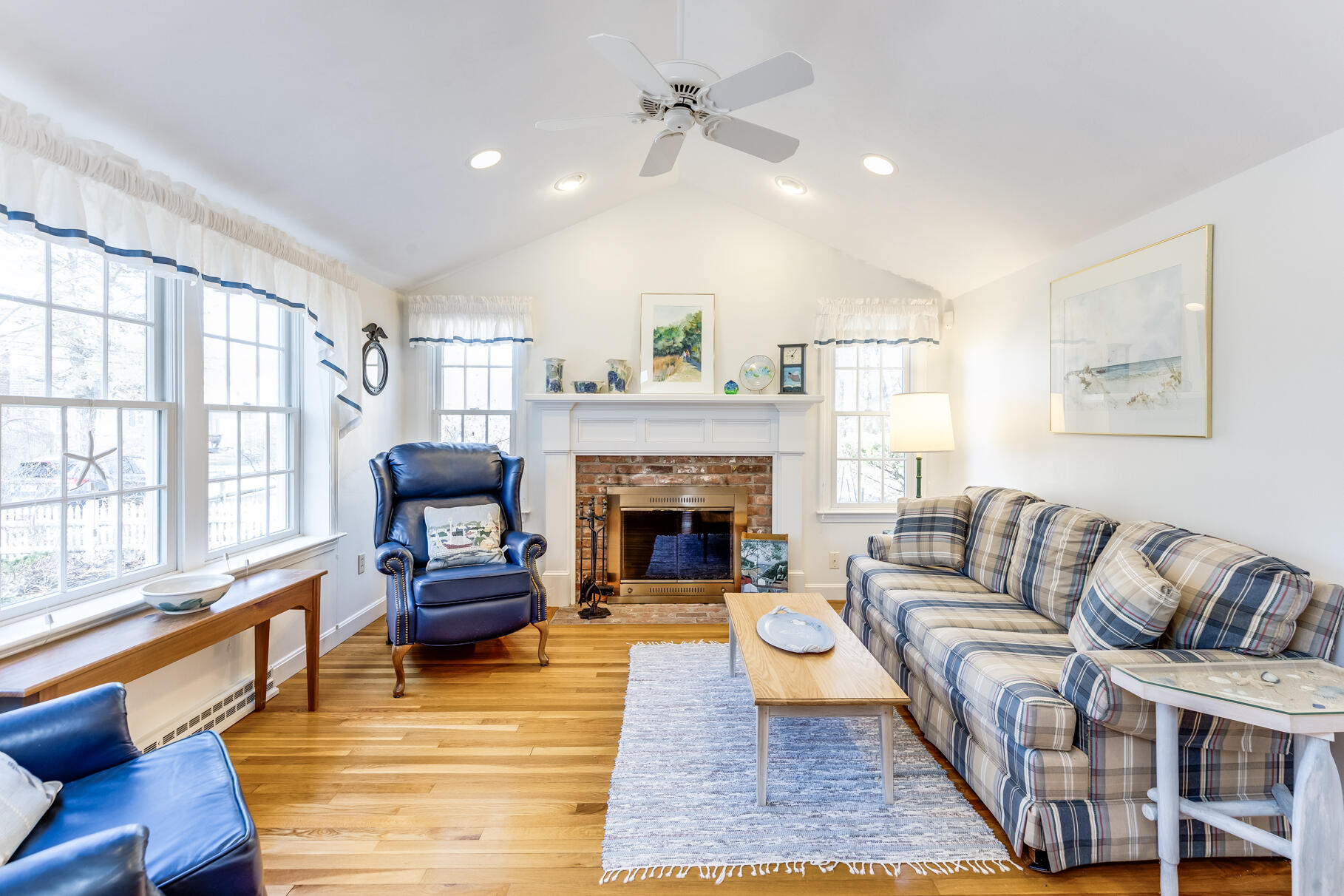23 Hall Avenue West Harwich, MA 02671 - Photo 21 of 62 a living room with furniture and a fireplace