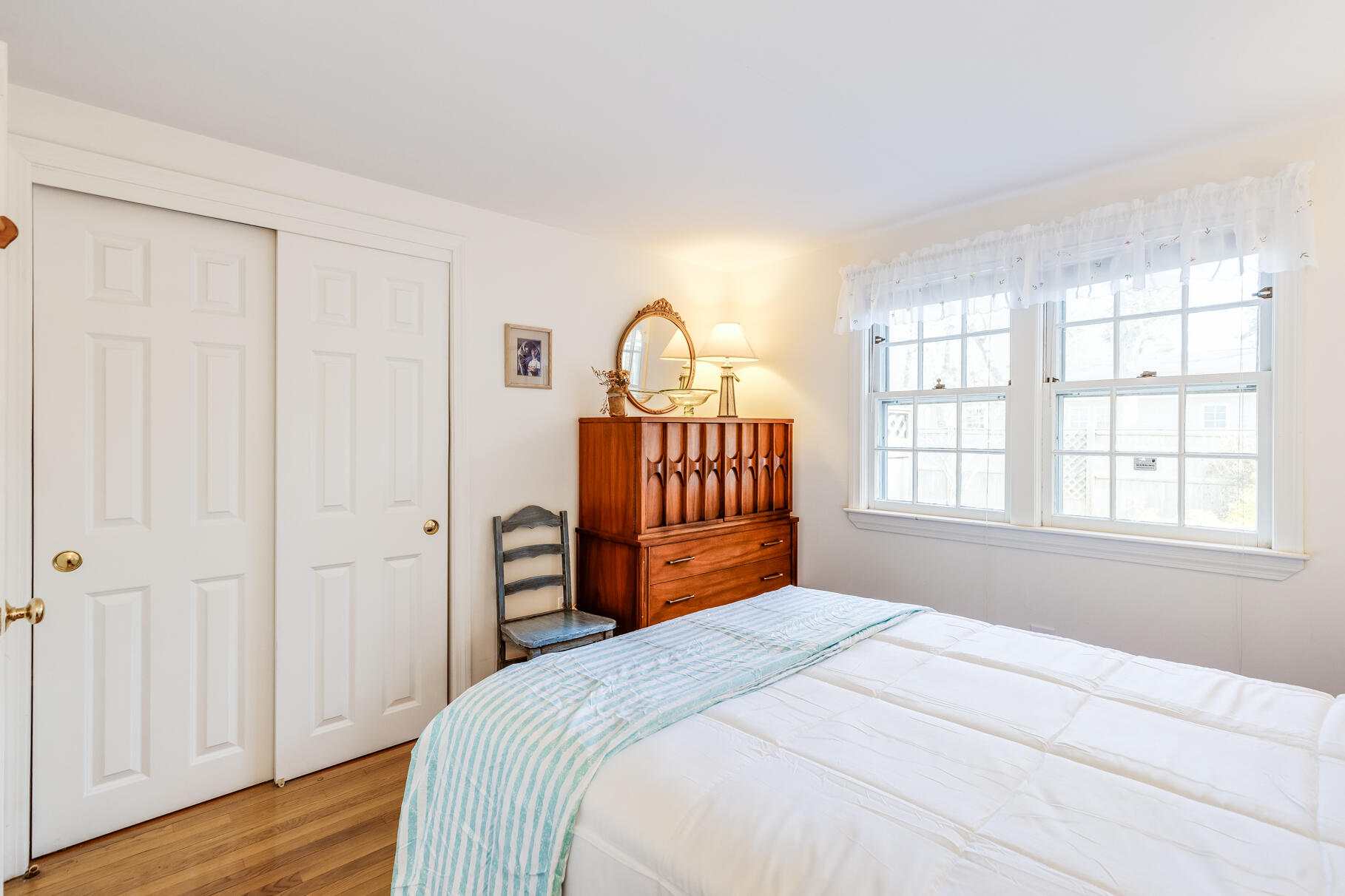 23 Hall Avenue West Harwich, MA 02671 - Photo 29 of 62 a bedroom with a bed and a window