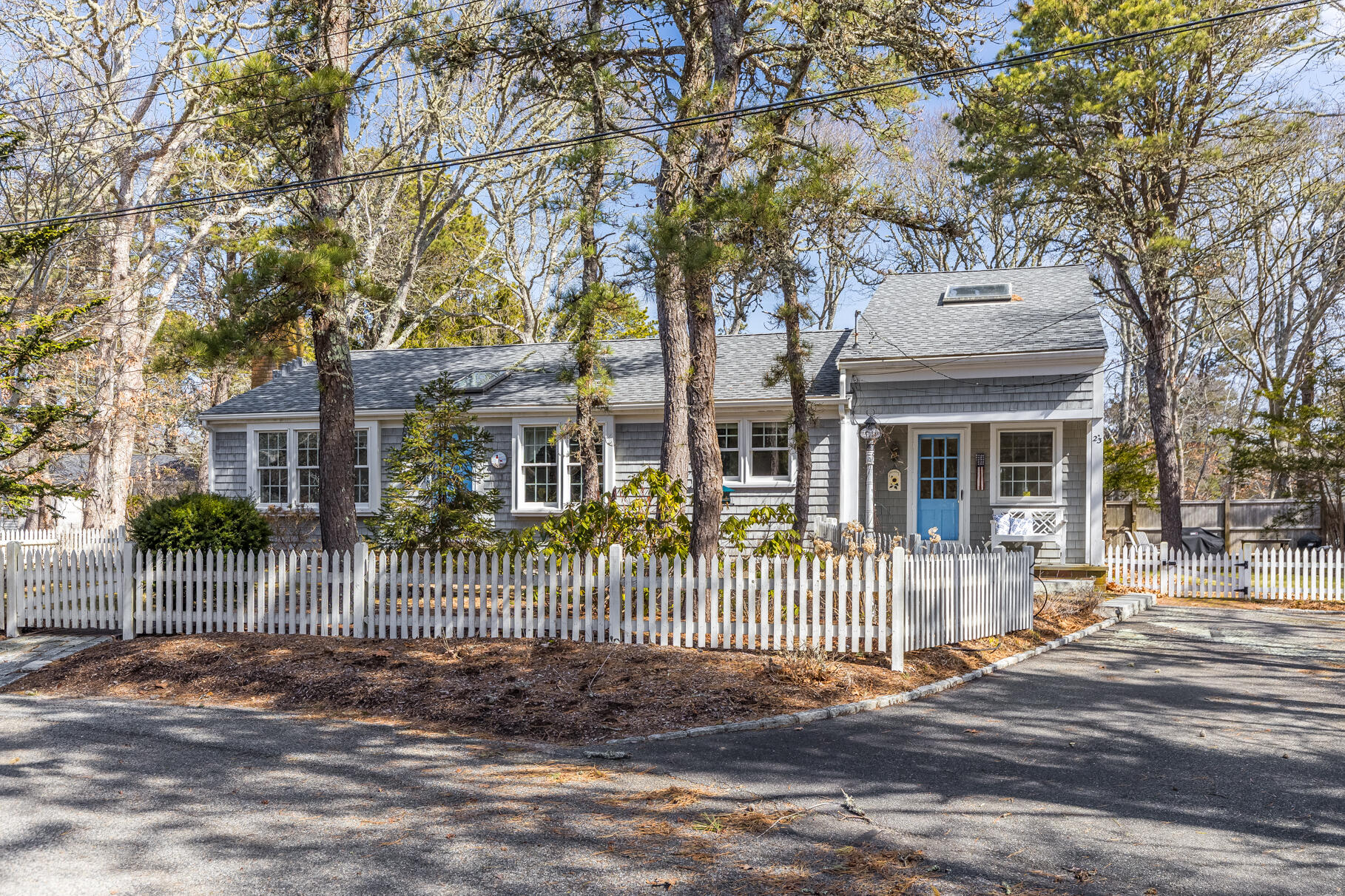 23 Hall Avenue West Harwich, MA 02671 - Photo 58 of 62 front view of a house with a iron gate