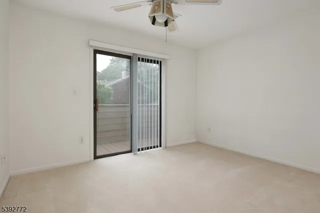 an empty room with sliding door